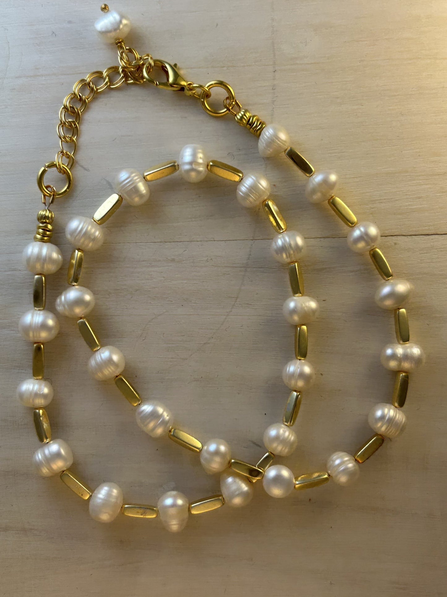 Fresh water pearls and gold beads